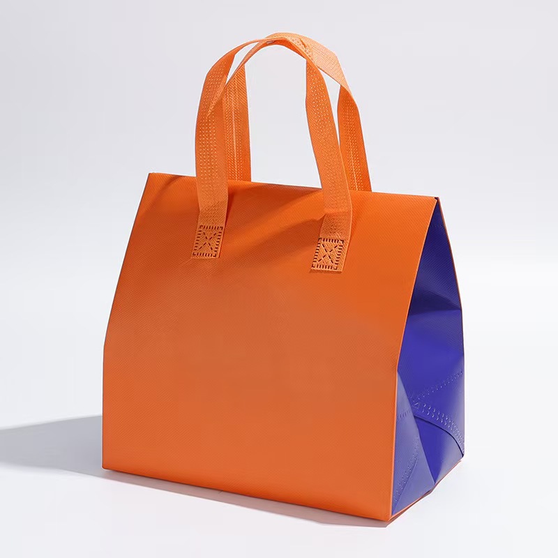 100 TÚI GIỮ NHIỆT TRƠN - MÀU CAM, CẠNH BÊN XANH BIỂN (Giá của 100 túi)