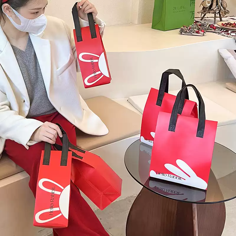 100 TÚI GIỮ NHIỆT MÀU ĐỎ IN HÌNH TAI THỎ (Giá của 100 túi)