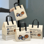 100 TÚI GIỮ NHIỆT MÀU BƠ - IN HÌNH BÁNH DONUTS (Giá của 100 túi)