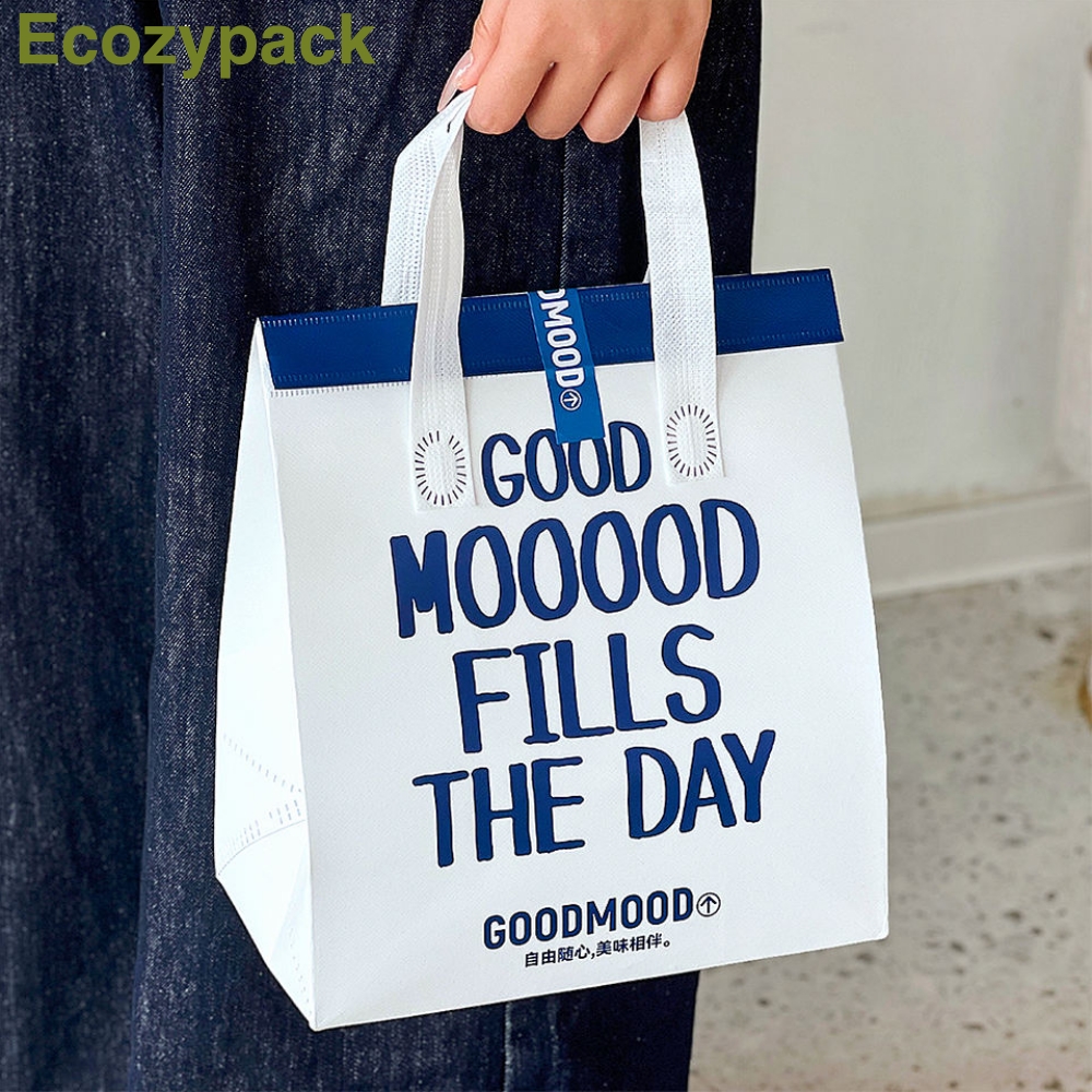 100 TÚI GIỮ NHIỆT TRƠN - MÀU TRẮNG QUAI XANH IN CHỮ GOOD MOOOOD IS THE DAY (Giá của 100 túi)